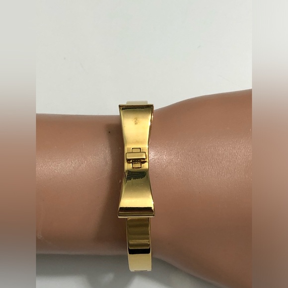 Kate Spade New York Goldtone Bow Bangle Bracelet . - Picture 9 of 9